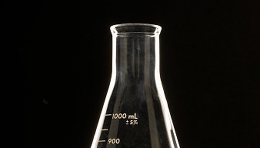 Photo Credit: Siri Stafford/Photodisc/Getty Images Crush chunks of powder against the walls of the beaker with the glass rod to break them up.
