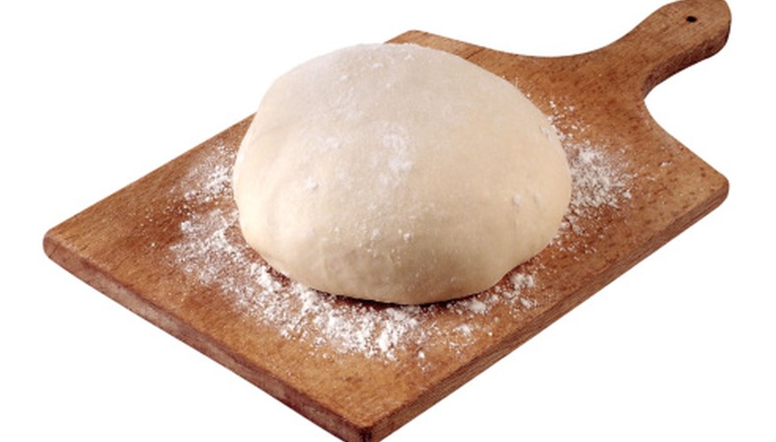 Photo Credit: Brand X Pictures/Brand X Pictures/Getty Images Baking soda's primary use is to make bread and pastries rise, but you can use it to make water alkaline too.