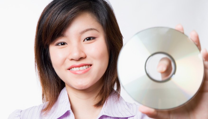 Only touch the outer rim and inner hole once the CD is dry. Only touch the outer rim and inner hole once the CD is dry.