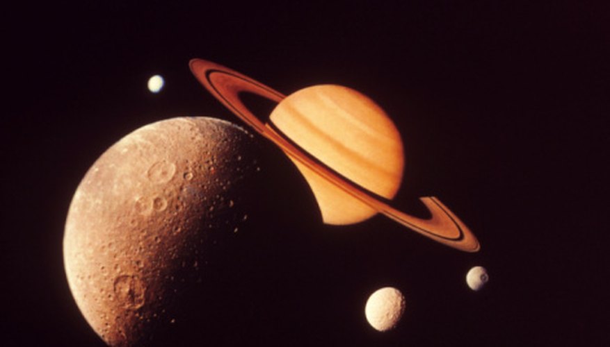 Photo Credit: Ablestock.com/AbleStock.com/Getty Images There are over 100 worlds in our solar system.
