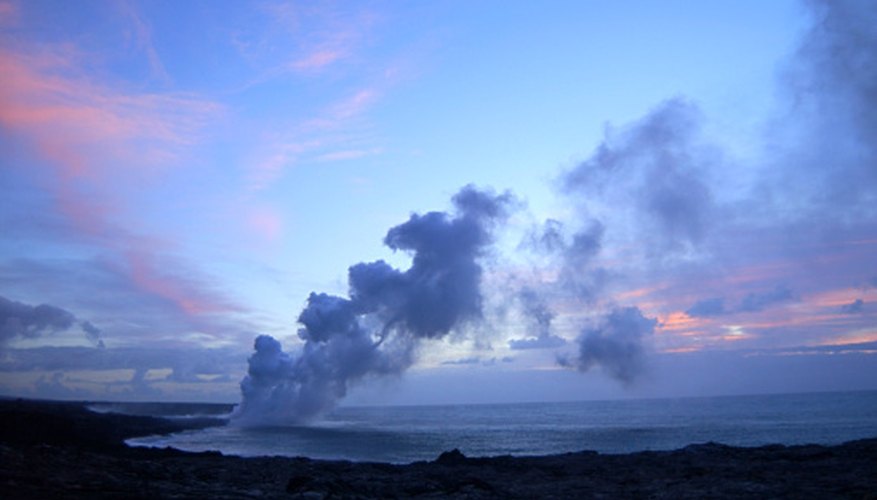 Photo Credit: Jupiterimages/Comstock/Getty Images You can produce smoke from a volcano by placing a cup of water in it and adding some dry ice.