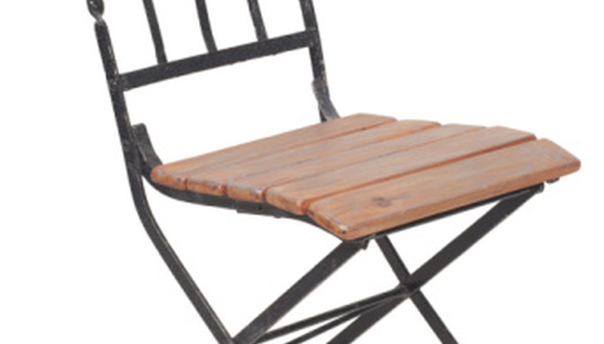 Photo Credit: Hemera Technologies/PhotoObjects.net/Getty Images A chair with metal (conducting) and wooden (nonconducting) parts
