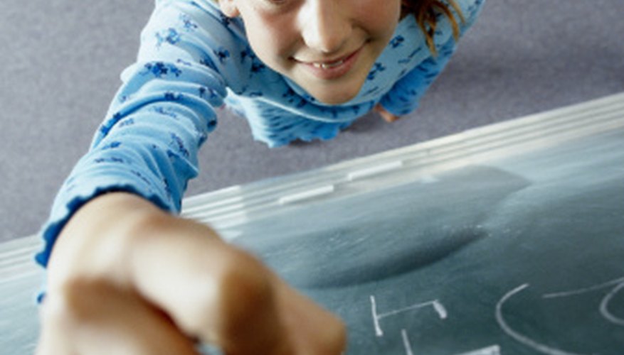 Photo Credit: Brand X Pictures/Brand X Pictures/Getty Images Third-graders are ready to learn long division.