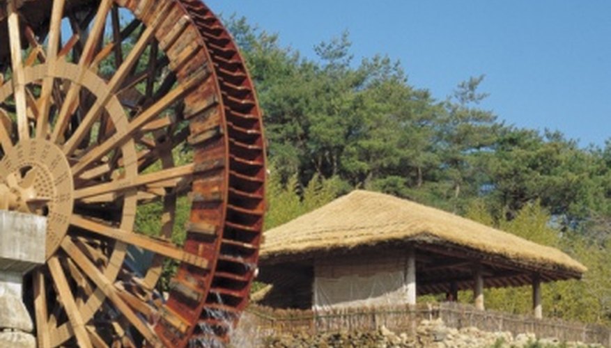 Photo Credit: Jupiterimages/Photos.com/Getty Images Water mills have been used around the world from the earliest days of history.