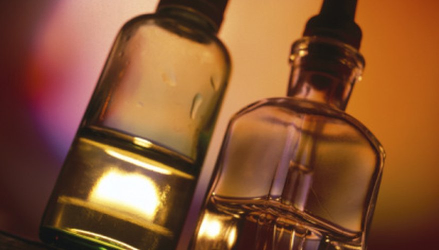 A few drops of essential oil help deodorize a smelly leather surface. A few drops of essential oil help deodorize a smelly leather surface.