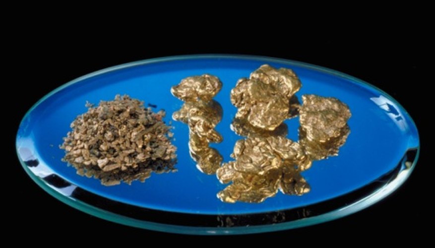 Photo Credit: Jupiterimages/Photos.com/Getty Images Gold mineral is just one of hundreds of minerals found in Washington State.