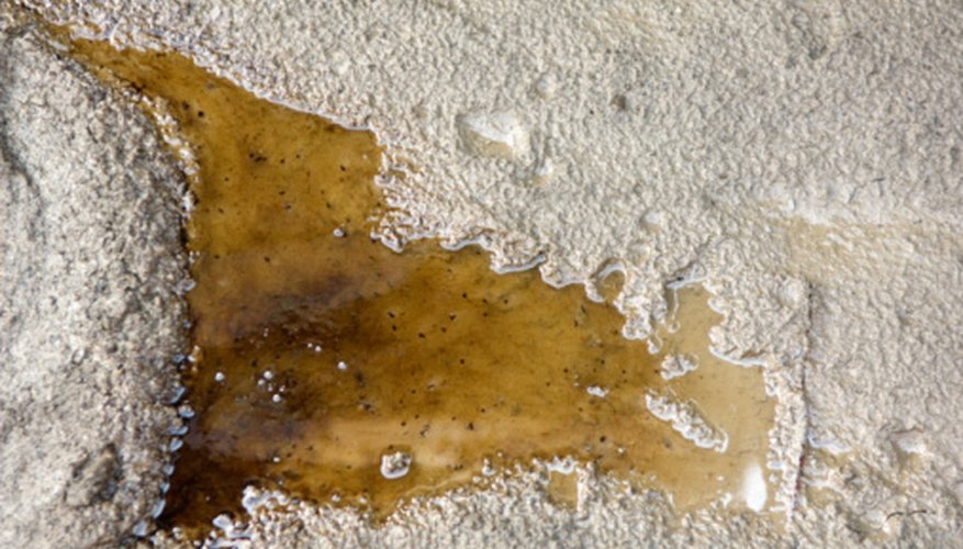 Photo Credit: Jupiterimages/Photos.com/Getty Images Used motor oil can be a cheap source of heating fuel.