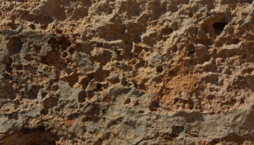 Photo Credit: Hemera Technologies/AbleStock.com/Getty Images Lava rocks are porous, meaning they are filled with tiny holes or pores.