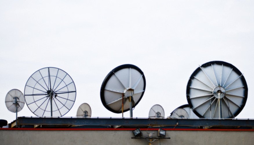 Photo Credit: Jupiterimages/Photos.com/Getty Images Engineers use polynomials to determine the best placement for a satellite's antenna.