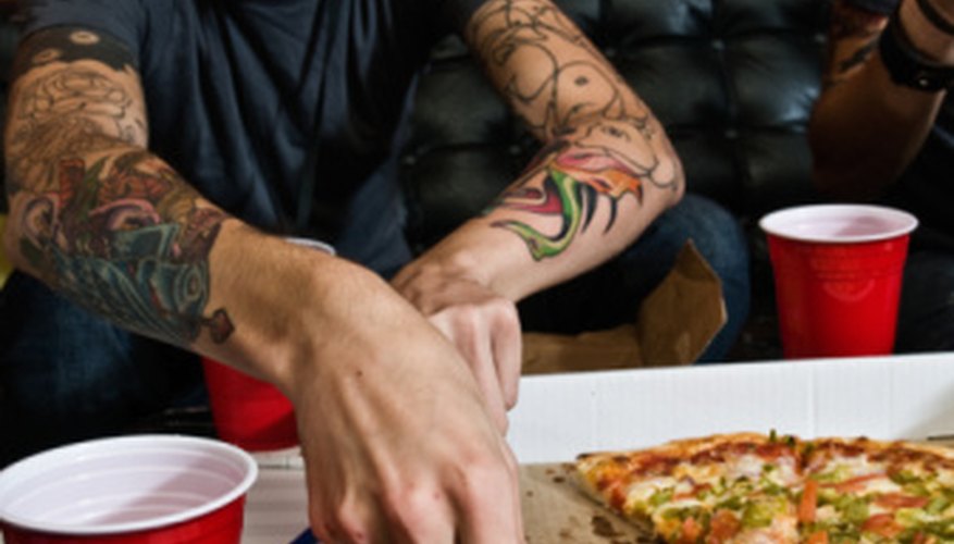 Photo Credit: Jupiterimages/Photos.com/Getty Images Slices of pizza can be used to represent fractions or ratios.