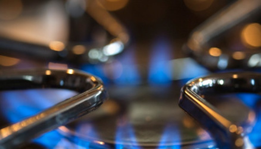 Photo Credit: Thinkstock/Comstock/Getty Images The natural gas fueling appliances such as gas-powered stoves has been processed to mostly isolate methane by removing other hydrocarbons such as propane and butane.