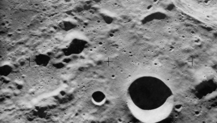 Photo Credit: Chad Baker/NASA/Digital Vision/Getty Images The surface of Mercury is scarred with craters.