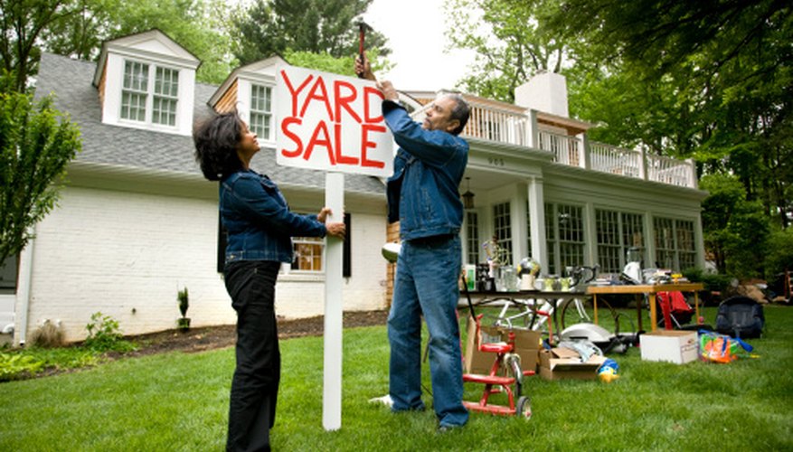 Post signs to attract customers to your yard sale.
