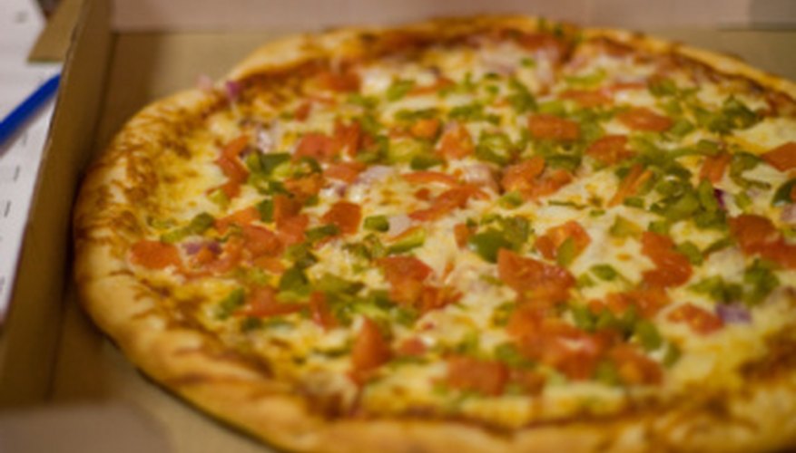 Photo Credit: Jupiterimages/Photos.com/Getty Images You can use a fake pizza to teach your students about fractions.