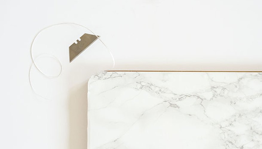 Marble contact paper can be cut to size in order to fit any surface. Marble contact paper can be cut to size in order to fit any surface.