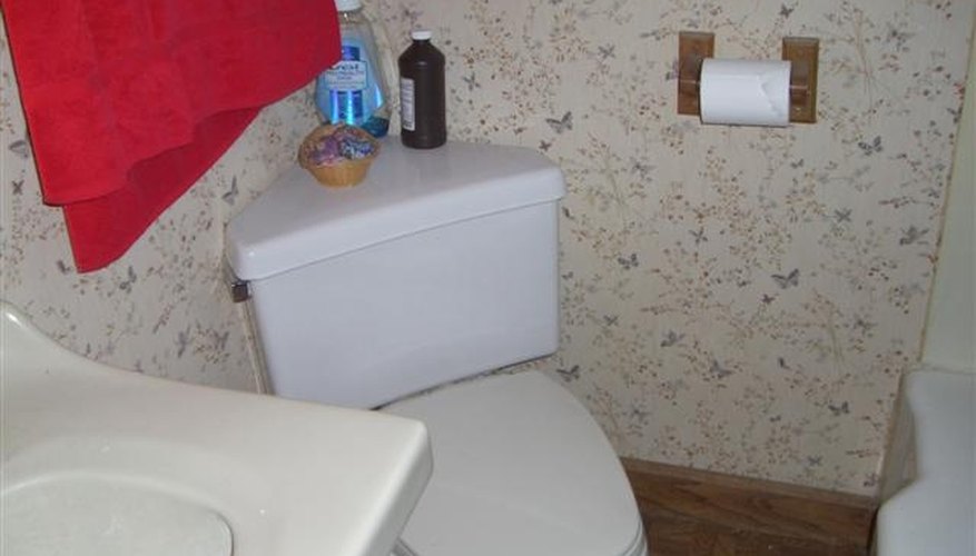 Before Remodel: Toilet, Vanity and Edge of Bathtub. Before Remodel: Toilet, Vanity and Edge of Bathtub.