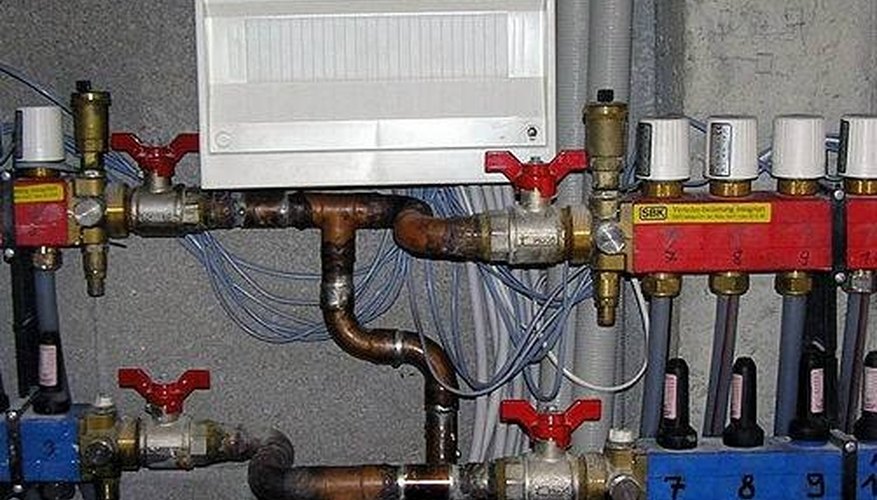 Controls for whole-house radiant heating--red is outgoing warm water Controls for whole-house radiant heating--red is outgoing warm water
