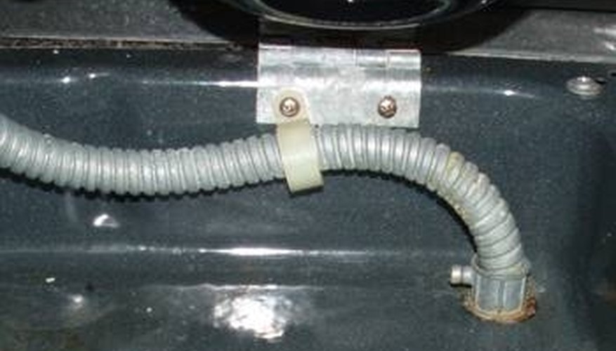 Snake the wire through here. Snake the wire through here.