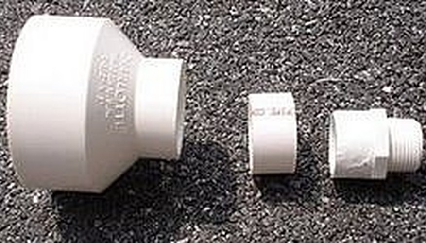 PVC adapter, 1&1/2 inch pipe, and 4 inch adapter PVC adapter, 1&1/2 inch pipe, and 4 inch adapter