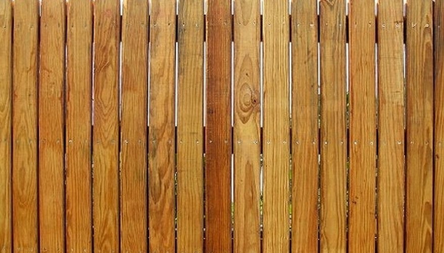 This cedar stockade style fence uses standard grade pickets. This cedar stockade style fence uses standard grade pickets.