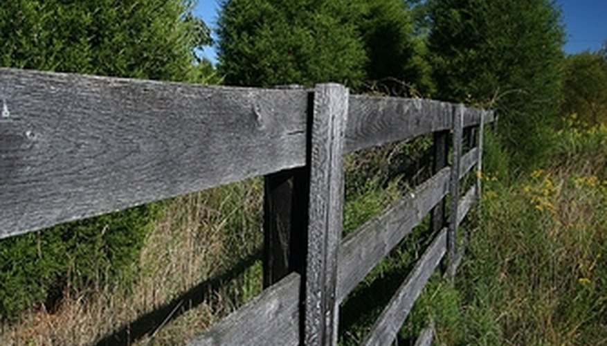 An untreated cedar split style fence. An untreated cedar split style fence.
