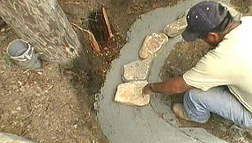 Place river rocks in the mortar. Place river rocks in the mortar.