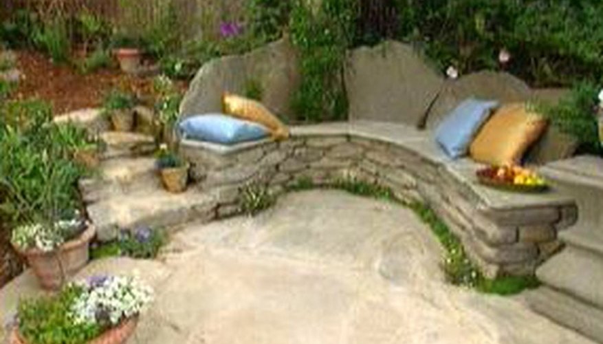 A stone bench blends with nature. A stone bench blends with nature.