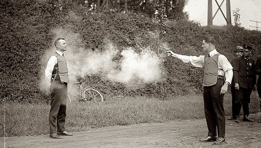 Bulletproof vest testing in Washington, D.C., circa 1923. Bulletproof vest testing in Washington, D.C., circa 1923.