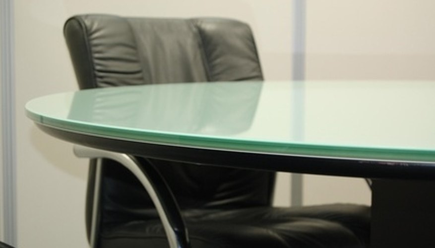 Glass table and conference chair Glass table and conference chair