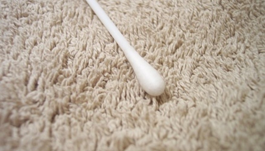 Apply glyercin to the stained area with a cotton swab. Apply glyercin to the stained area with a cotton swab.