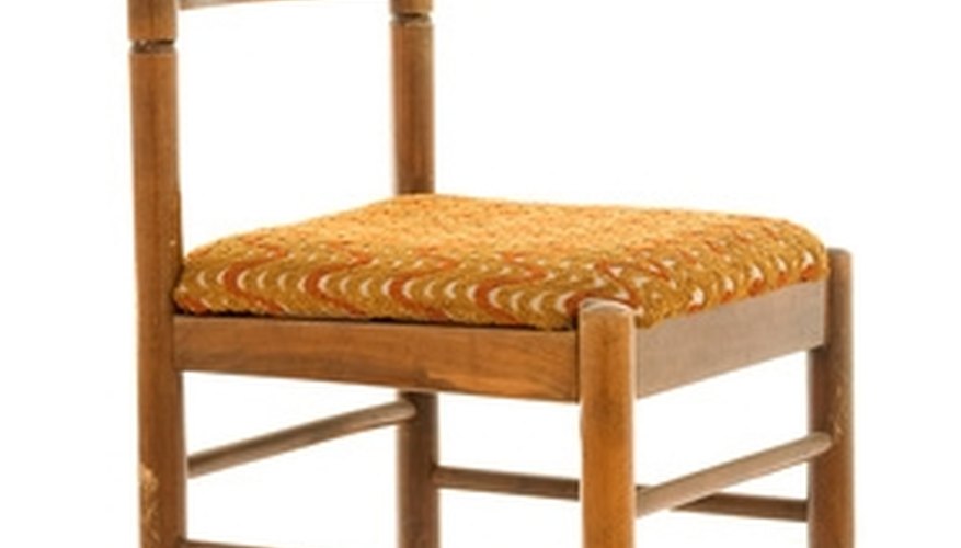 See the braces at the front and back of the chair and the slats that form the back. See the braces at the front and back of the chair and the slats that form the back.