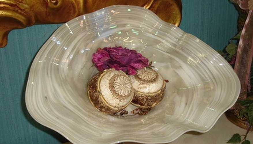 Blown glass incorporates colors and swirled patterns for its opaque look. Blown glass incorporates colors and swirled patterns for its opaque look.