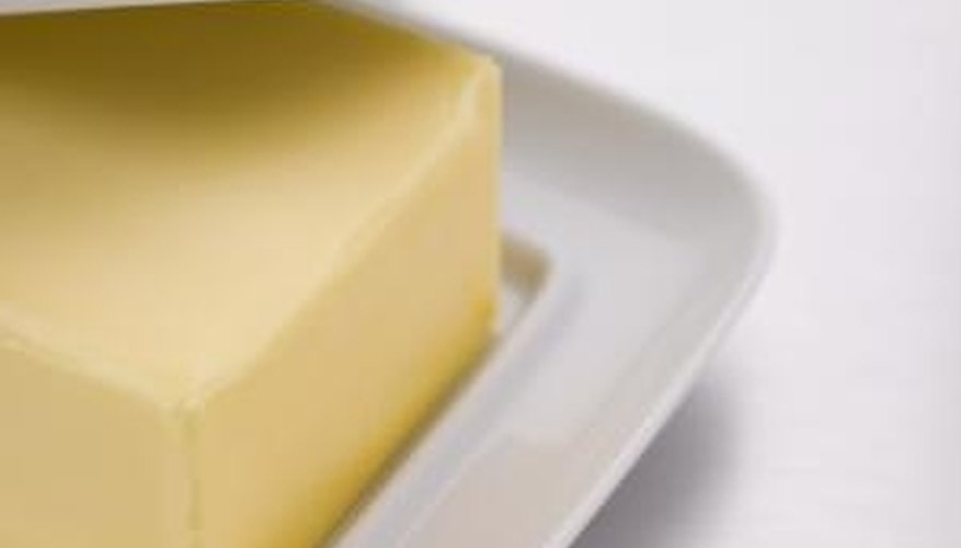 The grease in butter helps loosen ink from vinyl. The grease in butter helps loosen ink from vinyl.