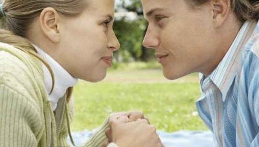 Powerful eye contact between two people could mean dominance, interest or affection. Powerful eye contact between two people could mean dominance, interest or affection.