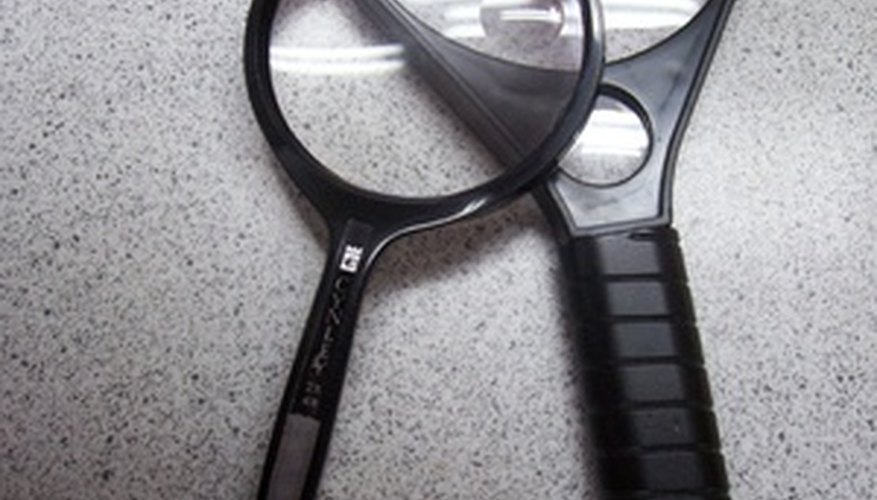 Photo Credit: lens image by Rog999 from <a href='http://www.fotolia.com'>Fotolia.com</a> Magnification can be converted to diopters using a mathematical formula.