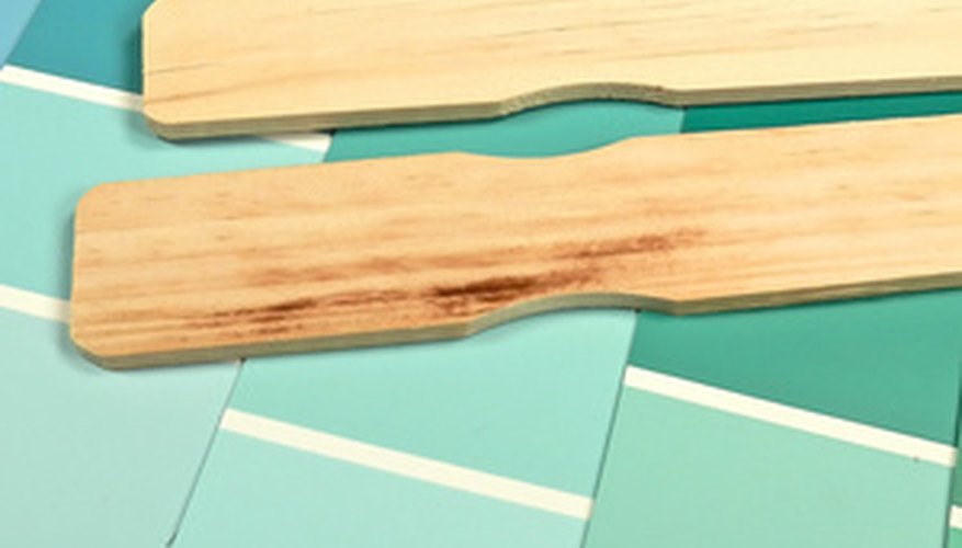 Mix your fiberglass cleansing solution with a paint stirrer. Mix your fiberglass cleansing solution with a paint stirrer.