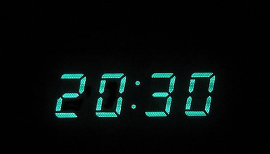 Photo Credit: digital clock image by JoLin from <a href='http://www.fotolia.com'>Fotolia.com</a> Setting the clock is the first step in making the Time Tracker work correctly.