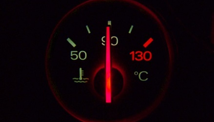 Photo Credit: temperature dial image by Robert Kelly from <a href='http://www.fotolia.com'>Fotolia.com</a> A temperature gauge connects to a termperature sensor.
