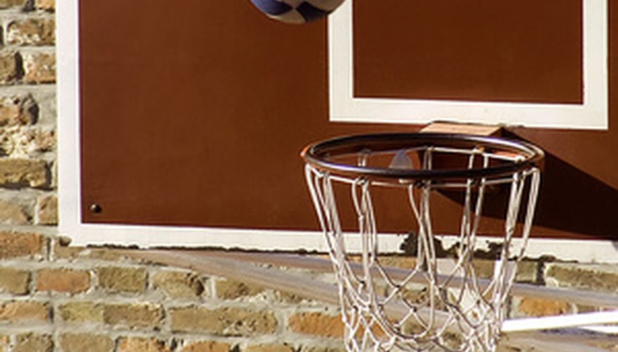 During a free throw, players must wait until the ball hits the rim. During a free throw, players must wait until the ball hits the rim.