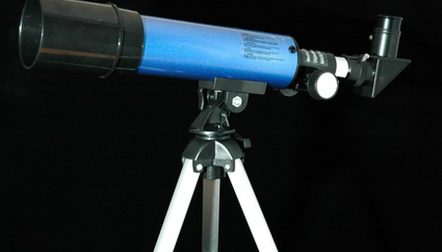 Photo Credit: telescope image by Warren Millar from <a href='http://www.fotolia.com'>Fotolia.com</a> The Bushnell Voyager telescopes use refractive optics.