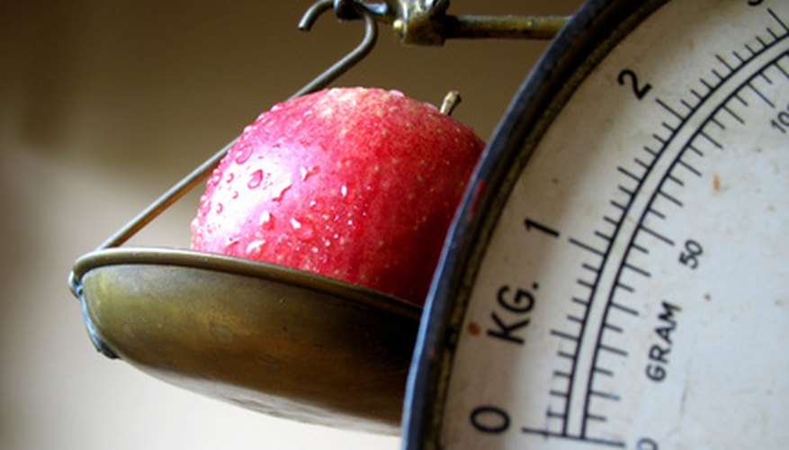 Photo Credit: apple on scale (focus on apple) image by Pontus Edenberg from <a href='http://www.fotolia.com'>Fotolia.com</a> How to Calculate Load Force
