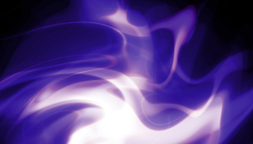 Photo Credit: Purple Fire image by Eric Burke from <a href='http://www.fotolia.com'>Fotolia.com</a> Breakdown voltage insulators can conduct electricity.