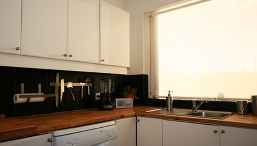 Paint instead of replacing those cabinets.