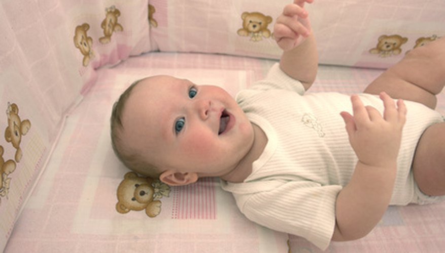 Crib mobiles should be removed when baby can push up on his or her arms. Crib mobiles should be removed when baby can push up on his or her arms.
