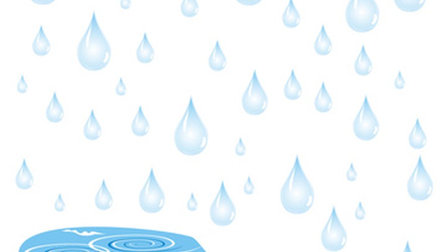 Photo Credit: drops of a rain image by amlet from <a href='http://www.fotolia.com'>Fotolia.com</a> Thiessen polygons provide a method for measuring rainfall.