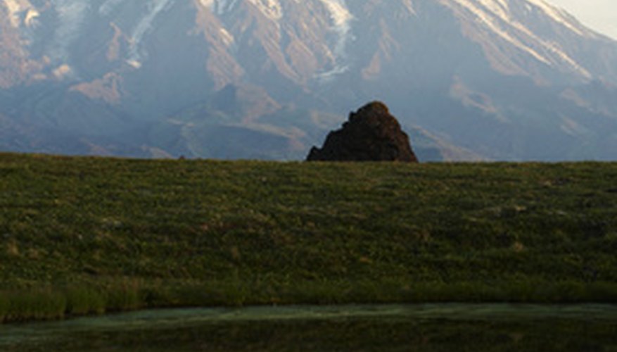 Photo Credit: Volcano on Kamchatka image by Galyna Andrushko from <a href='http://www.fotolia.com'>Fotolia.com</a> Volcanoes may lie dormant for thousands of years.