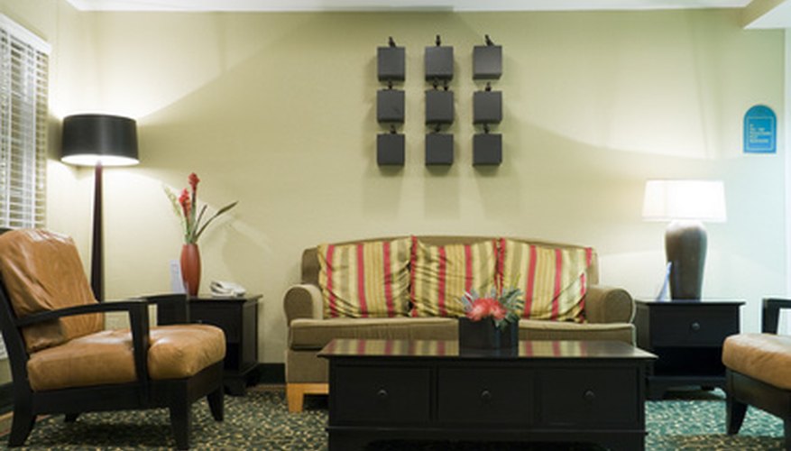 Photo Credit: Hotel lobby with a couch and two armchairs at night image by Alexey Stiop from <a href='http://www.fotolia.com'>Fotolia.com</a> Public space cleaners are responsible for lobbies, offices, corridors and other non-guestroom areas of the property.