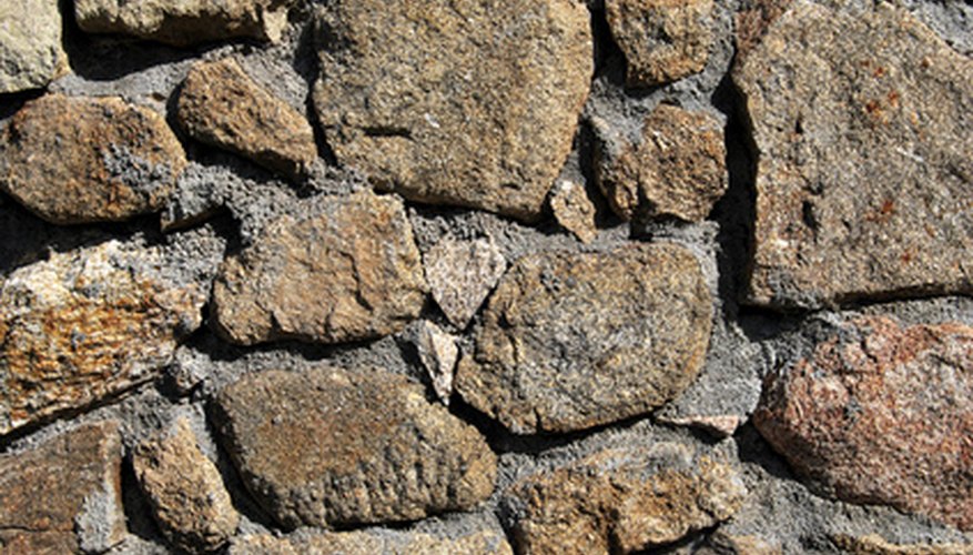 If framing feels difficult, mortar rocks into walls one large stone at a time. If framing feels difficult, mortar rocks into walls one large stone at a time.