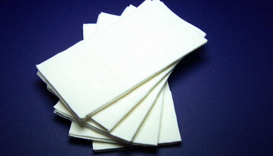 Crafting of a simple handkerchief doll begins with a man's white handkerchief. Crafting of a simple handkerchief doll begins with a man's white handkerchief.