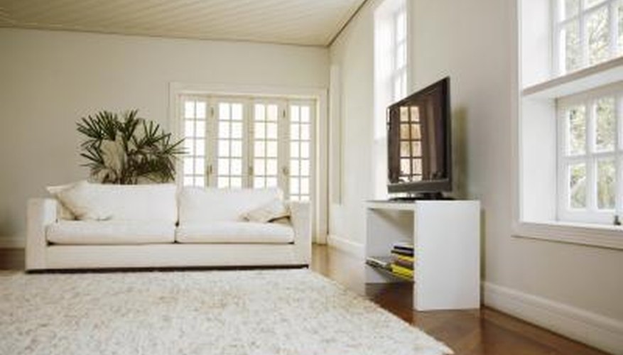 An interior of a modern living room before carpet instillation An interior of a modern living room before carpet instillation